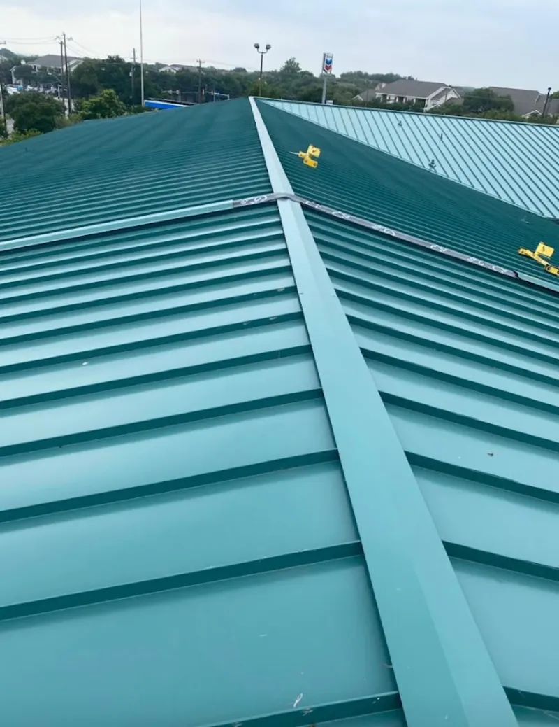 Green commercial metal roof ridge and valley for Metal Roof Repair in Barnesville
