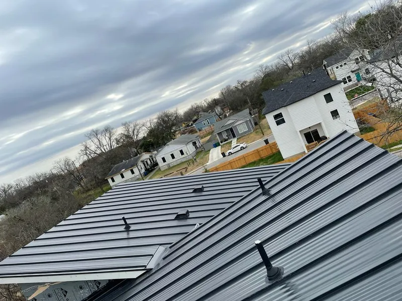 Standing seam metal roof panels with vents for Skylight Repair in Barnesville